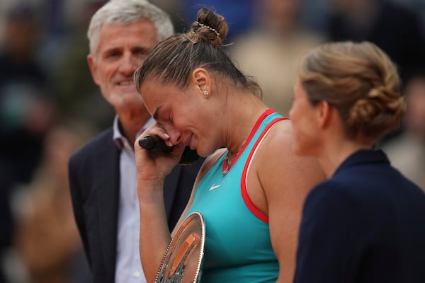 Aryna Sabalenka of Belarus cries during trophy presentation after losing the final match of the French Tennis Open at the Roland-Garros against United States' Coco Gauff in Paris, Saturday, June 7, 2025. (AP Photo/Thibault Camus)