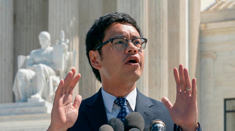 FILE - Dale Ho, an attorney for the American Civil Liberties Union, speaks to reporters after he argued before the Supreme Court against the Trump administration's plan to ask about citizenship on the 2020 census, in Washington, April 23, 2019. (AP Photo/J. Scott Applewhite, File)