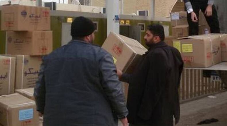The text tag for this photo online said “Just some Muslims with boxes but you see evil.” (Screen grab)