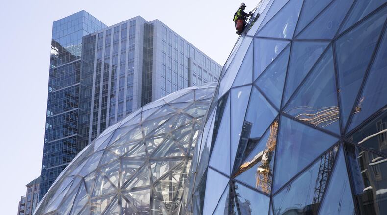 Large spheres in front of Amazon’s building in Seattle, Sept. 27, 2017. Amazon said in October it had received proposals from 238 cities and regions across North America that are vying for its new, second headquarters, called HQ2. (Ruth Fremson/The New York Times)