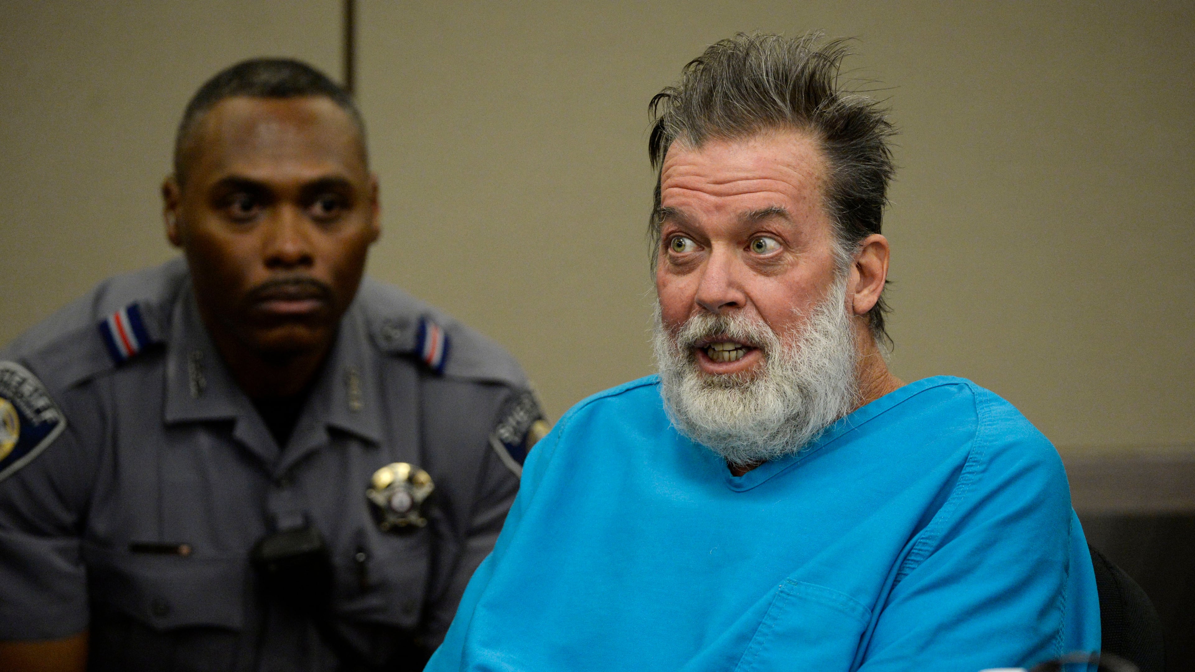 FILE - Robert Dear talks to Judge Gilbert Martinez during a court appearance in Colorado Springs, Colo., on Dec. 9, 2015. (Andy Cross/The Denver Post via AP, Pool, File)