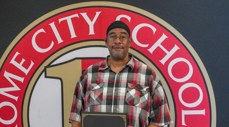 Rome City Schools bus driver Nakita Strickland was honored at an August 13, 2024 school-board meeting for his actions in a crash that occurred August 8 when his bus carrying members of the Rome High football team was struck by a car that had crossed into oncoming traffic. While the bus rolled over multiple times, no lives were lost in the wreck and injuries were relatively minor. According to a proclamation, “his dedication and swift actions ensured the safety of our students, and we are truly fortunate to have him as part of our team.” (Photo provided by Rome City Schools)