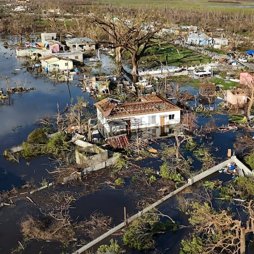 FILE - Debris surrounds damaged homes along the Black River, Jamaica, Thursday, Oct. 30, 2025, in the aftermath of Hurricane Melissa. (AP Photo/Matias Delacroix, File)