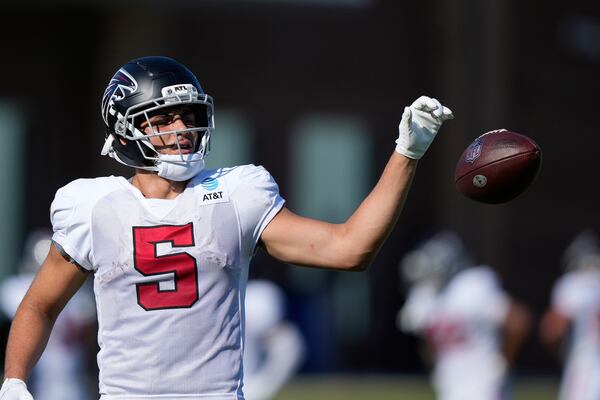 Atlanta Falcons wide receiver Drake London (5) runs drills during an NFL football training camp practice on Monday, Aug. 17, 2026, in Flowery Branch, Ga. (AP Photo/Brynn Anderson)