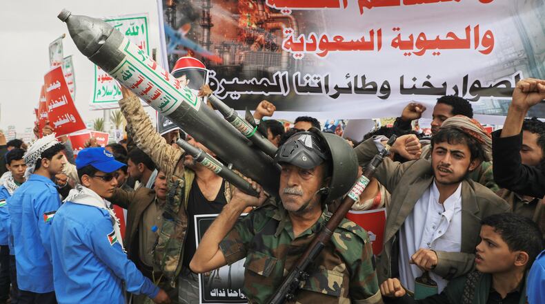 Houthi supporters hold a rally in Sanaa, Yemen, Friday, July 17, 2026, against the Saudi-led coalition. Banner in Arabic reads, "All Saudi oil facilities are targets to our missiles and drones." (AP Photo/Osamah Abdulrahman)