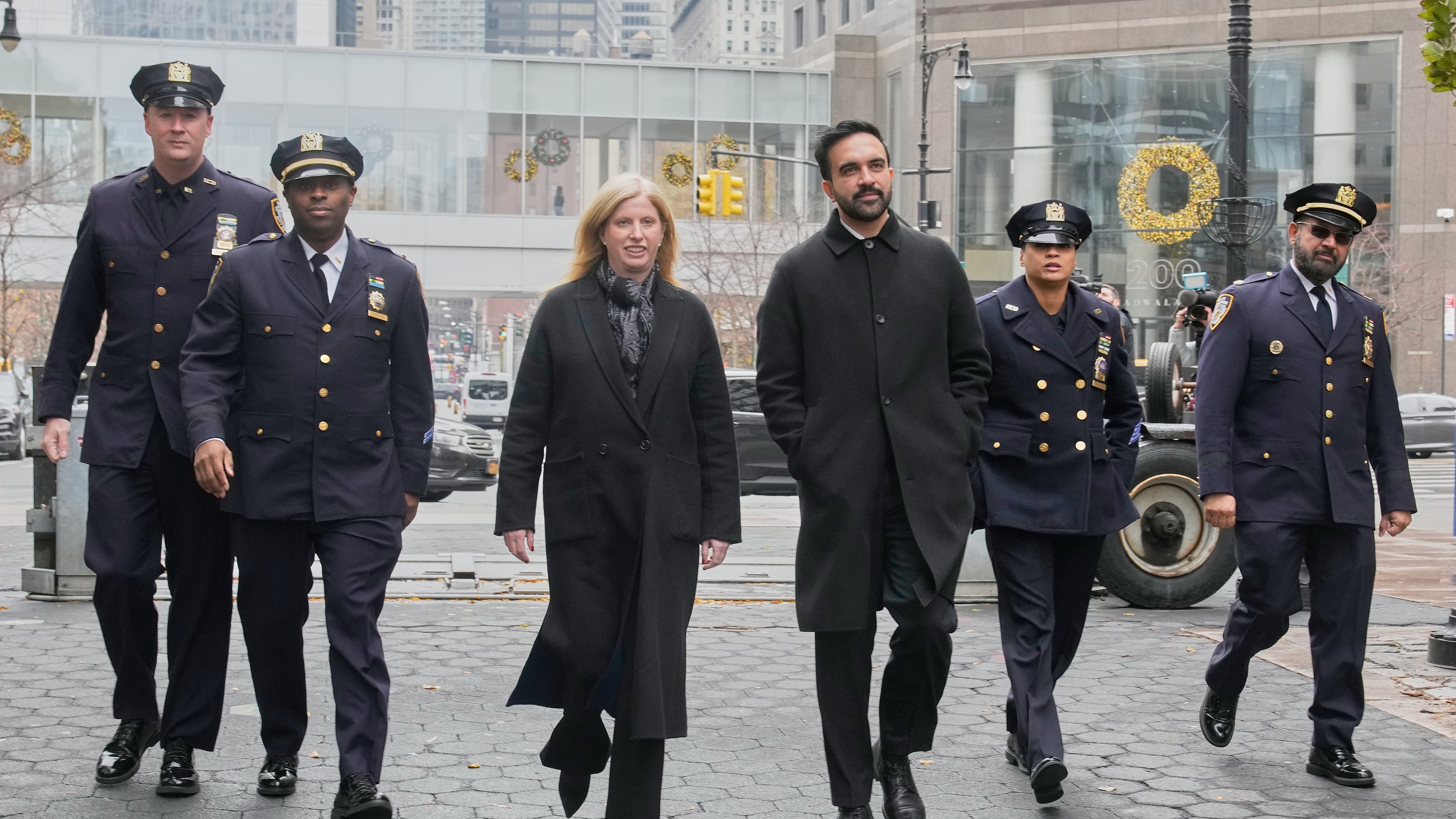 New York Mayor-elect Zohran Mamdani and New York City Police Commissioner Jessica Tisch walk to the New York City Police Memorial, Wednesday, Nov. 19, 2025. (AP Photo/Richard Drew)