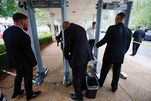 Security personnel conduct searches on all the people entering the Ahavath Achim Synagogue as members of the Jewish community gather to commemorate the second anniversary of the Oct. 7 attacks on Sunday, October 5, 2025.
(Miguel Martinez/ AJC)