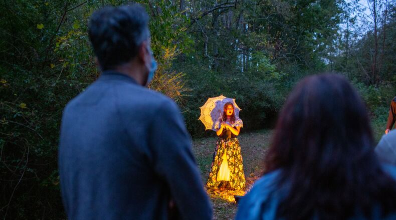 Senior Kat Pattillo performs for audience members at Cambridge High School in Milton, Georgia, on Saturday, October 31, 2020. The Cambridge High School Theatre program performed The Occurrence at Sleepy Hollow outside along the school’s trails; audience members were guided through different stages of the short story by Washington Irving. (Rebecca Wright for the Atlanta Journal-Constitution)