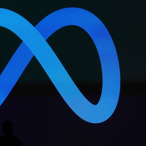 FILE -A Meta logo is shown on a video screen at LlamaCon 2025, an AI developer conference, in Menlo Park, Calif., April 29, 2025. (AP Photo/Jeff Chiu, File)
