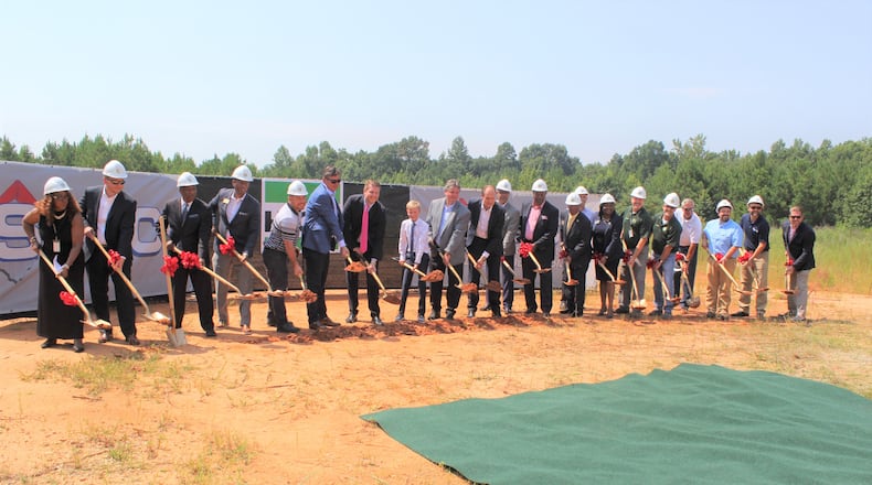 Stockbridge officials join Helga Group and others in breaking ground on a new $4 million-$6 million glass manufacturing plant coming to the Henry County City. PHOTO: CITY OF STOCKBRIDGE