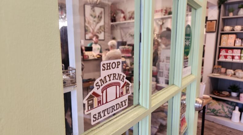 Customers stopped by to shop at Gifting Tree and The Secret Garden gift shop in Smyrna for Shop Smyrna Day, a localized version of Small Business Saturday. Maya T. Prabhu/maya.prabhu@ajc.com
