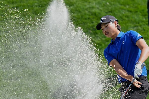 Min Woo Lee leaves his shot in the bunker on the ninth hole during the second round of The Players Championship golf tournament Friday, March 14, 2025, in Ponte Vedra Beach, Fla. (AP Photo/Chris O'Meara)
