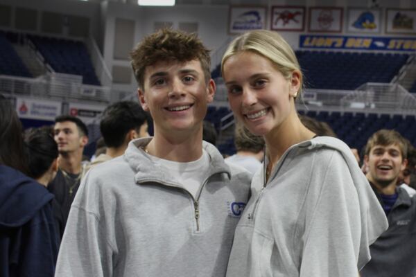 Twin siblings Liam Heaney, left, and Emma Heaney attend rehearsal for Plainview-Old Bethpage John F. Kennedy High School's graduation ceremony at Hofstra University in Hempstead, N.Y., on Tuesday, June 17, 2025. (AP Photo/Philip Marcelo)