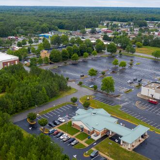 FILE - A drone photo taken on June 16, 2020, shows the Call Federal Credit Union, front, a bank robbed by Okello Chatrie in 2019 in Midlothian, Va. (AP Photo/Steve Helber, File)