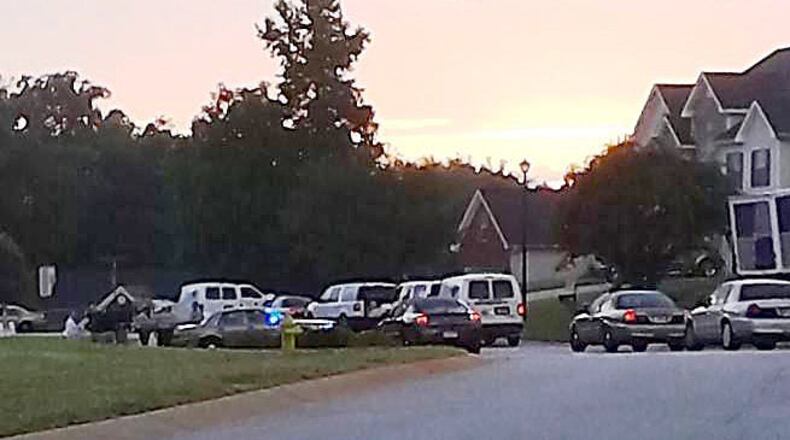 Deputies were called early Tuesday to a Newton County neighborhood, where a man was found shot to death. (Special photo)