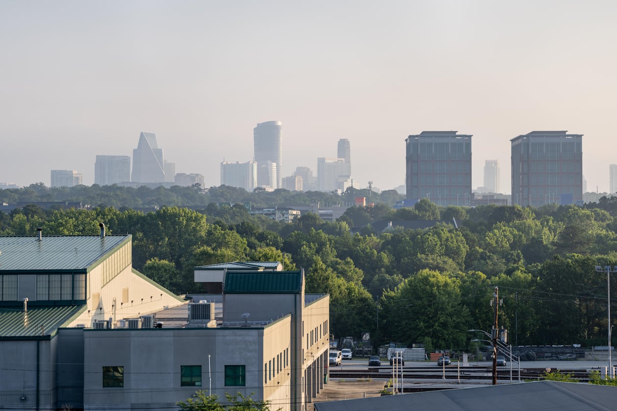 Atlanta's trees and skyline are shown in June 2025. (Ben Hendren for the AJC)