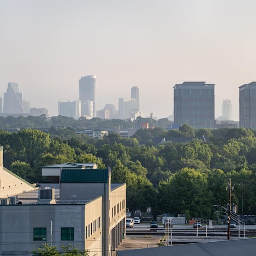 Atlanta's trees and skyline are shown in June 2025. (Ben Hendren for the AJC)