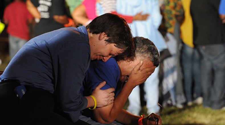 The Rev.Lynn Hopkins hugs Carolyn Bond at Georgia Diagnostic and Classification Prison moments after it was announced that Troy Anthony Davis had been executed on Wednesday, Sept 21,2011.