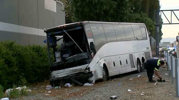 This image provided by KABC-TV shows a crashed tour bus after colliding with a sport utility vehicle, Sunday, May 11, 2025 in Los Angeles. (KABC-TV via AP)