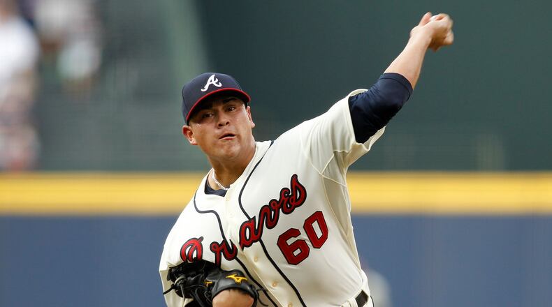 Atlanta Braves starting pitcher Manny Banuelos (60) throws in the first inning of a baseball game against the Chicago Cubs, Saturday, July 18, 2015, in Atlanta. (AP Photo/Brett Davis)
