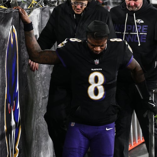 Baltimore Ravens quarterback Lamar Jackson (8) leaves the field during the first half of an NFL football game against the New England Patriots, Sunday, Dec. 21, 2025, in Baltimore. (AP Photo/Nick Wass)