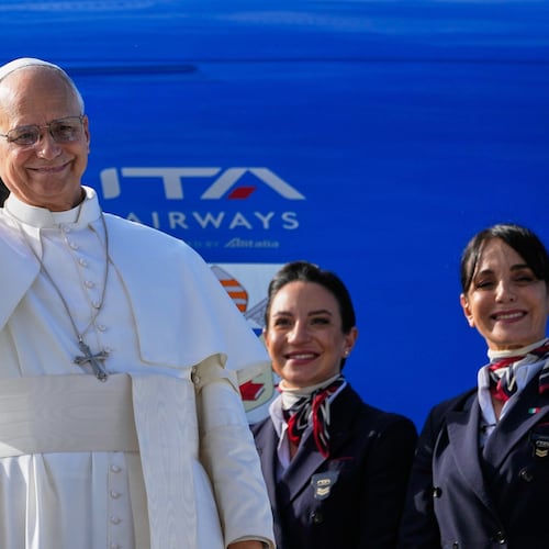 Pope Leo XIV waves as he boards a flight back to the Vatican after his visit to Lebanon at Beirut International Airport in Beirut, Lebanon, Tuesday, Dec. 2, 2025. (AP Photo/Hussein Malla)