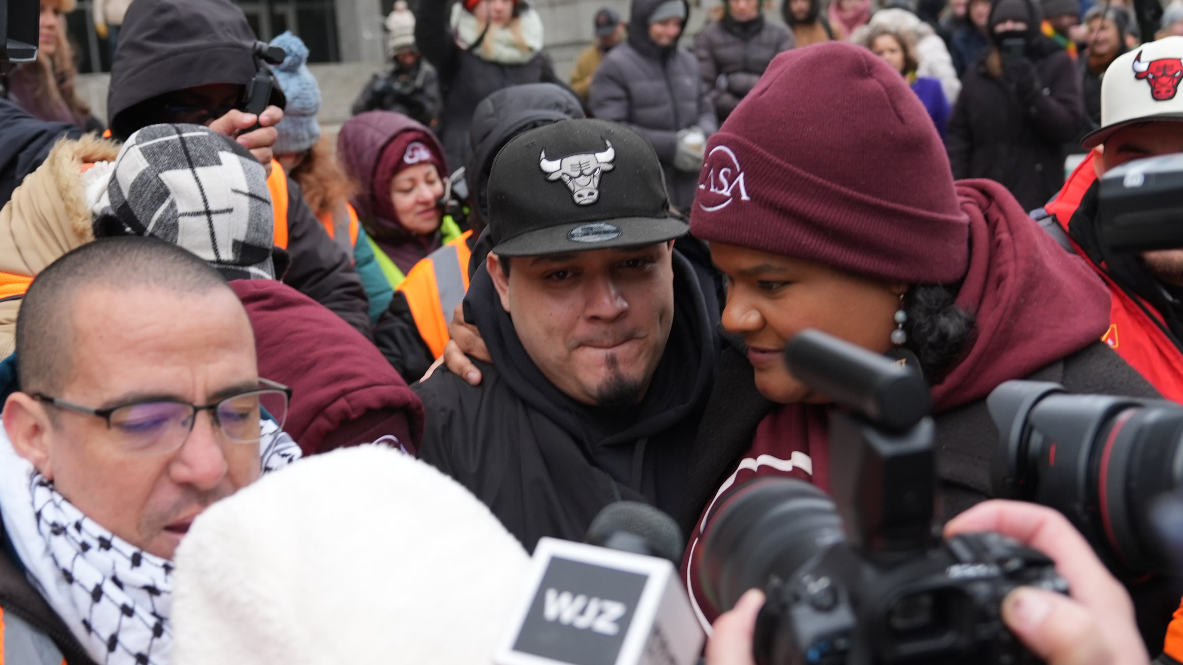 Kilmar Abrego Garcia leaves with Lydia Walther-Rodriguez of Casa in Maryland, after a mandatory check at the Immigration and Customs Enforcement office in Baltimore, Friday, Dec. 12, 2025, after he was released from detention on Thursday under a judge's order. (AP Photo/Stephanie Scarbrough)