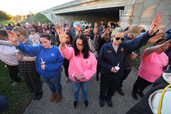 A prayer vigil was held Nov. 6, 2025, after a UPS plane crashed at Louisville Muhammad Ali International Airport. Fourteen people, including the three pilots, died. (Darron Cummings/AP)