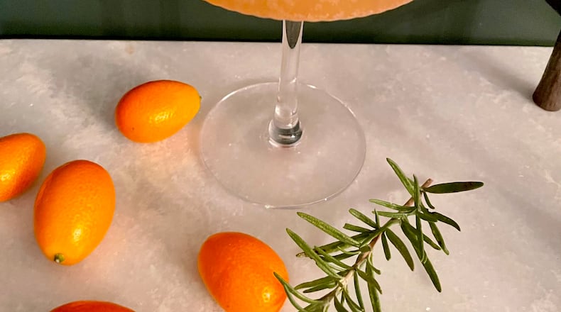 A fun way to use seasonal kumquats in a cocktail is a rosemary kumquat gin fizz. Angela Hansberger for The Atlanta Journal-Constitution