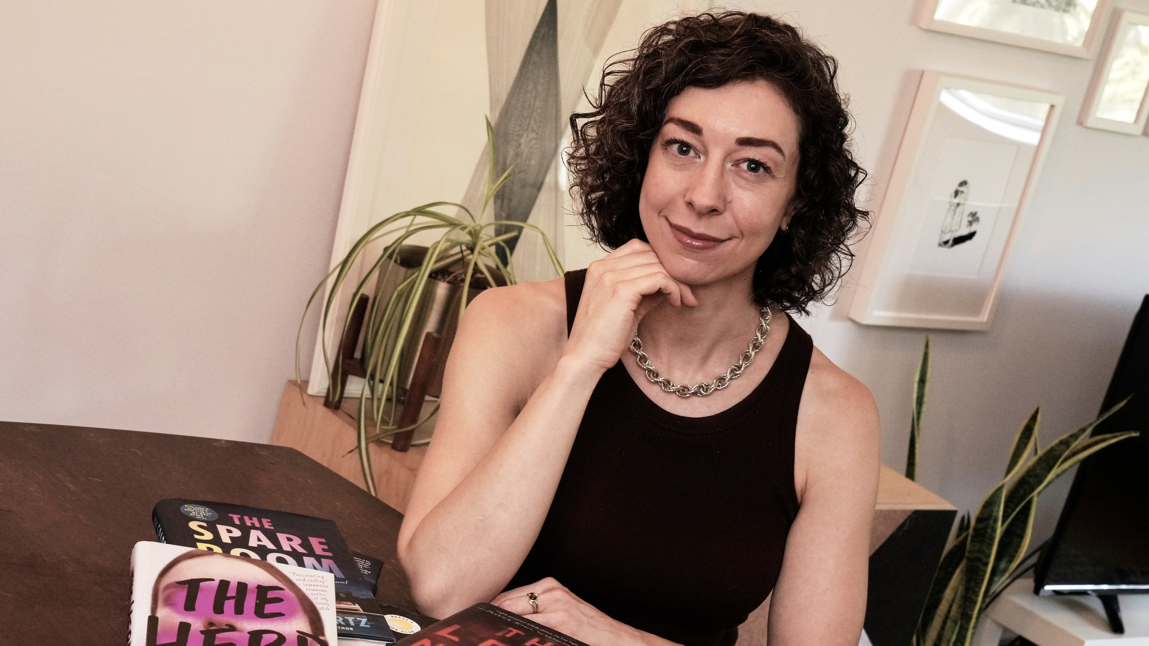 Thriller novelist Andrea Bartz is photographed in her home, in the Brooklyn borough of New York, Thursday, Sept. 4, 2025 (AP Photo/Richard Drew)