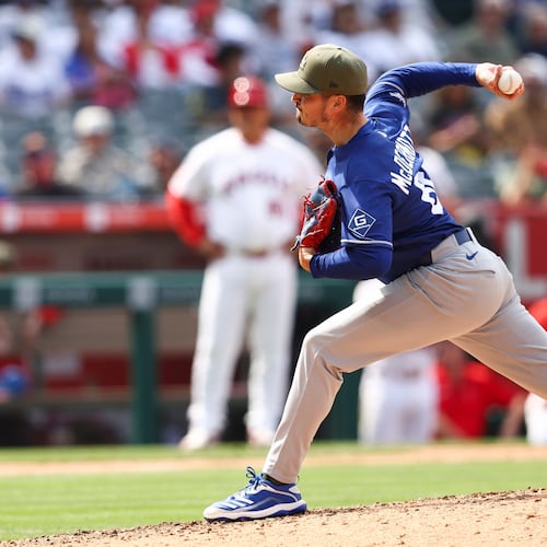 Los Angeles Dodgers pitcher Chayce McDermott throws to a Los Angeles Angels batter during the ninth inning of a baseball game, Sunday, May 17, 2026, in Anaheim, Calif. (AP Photo/Jessie Alcheh)