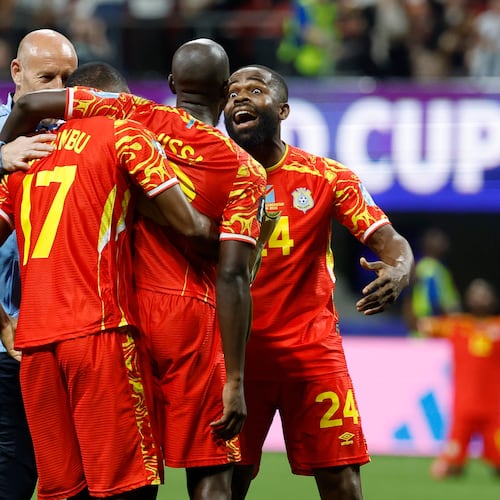 Congo's Cedric Bakambu (17), Yoane Wissa (20) and Gedeon Kalulu (24) celebrate a win during the World Cup Group K soccer match between DR Congo and Uzbekistan in Atlanta, Saturday, June 27, 2026. (AP Photo/Erik S. Lesser)