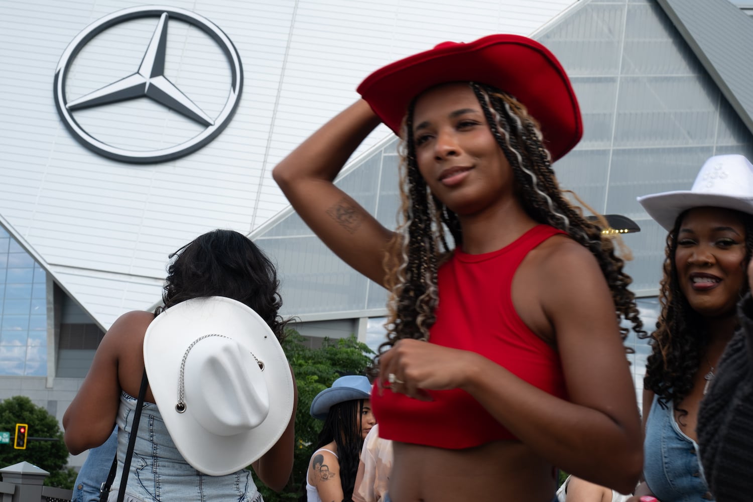 Fans arrive at Mercedes-Benz Stadium for Beyoncè’s “Cowboy Carter” show Friday, July 11, 2025.   Ben Gray for the Atlanta Journal-Constitution