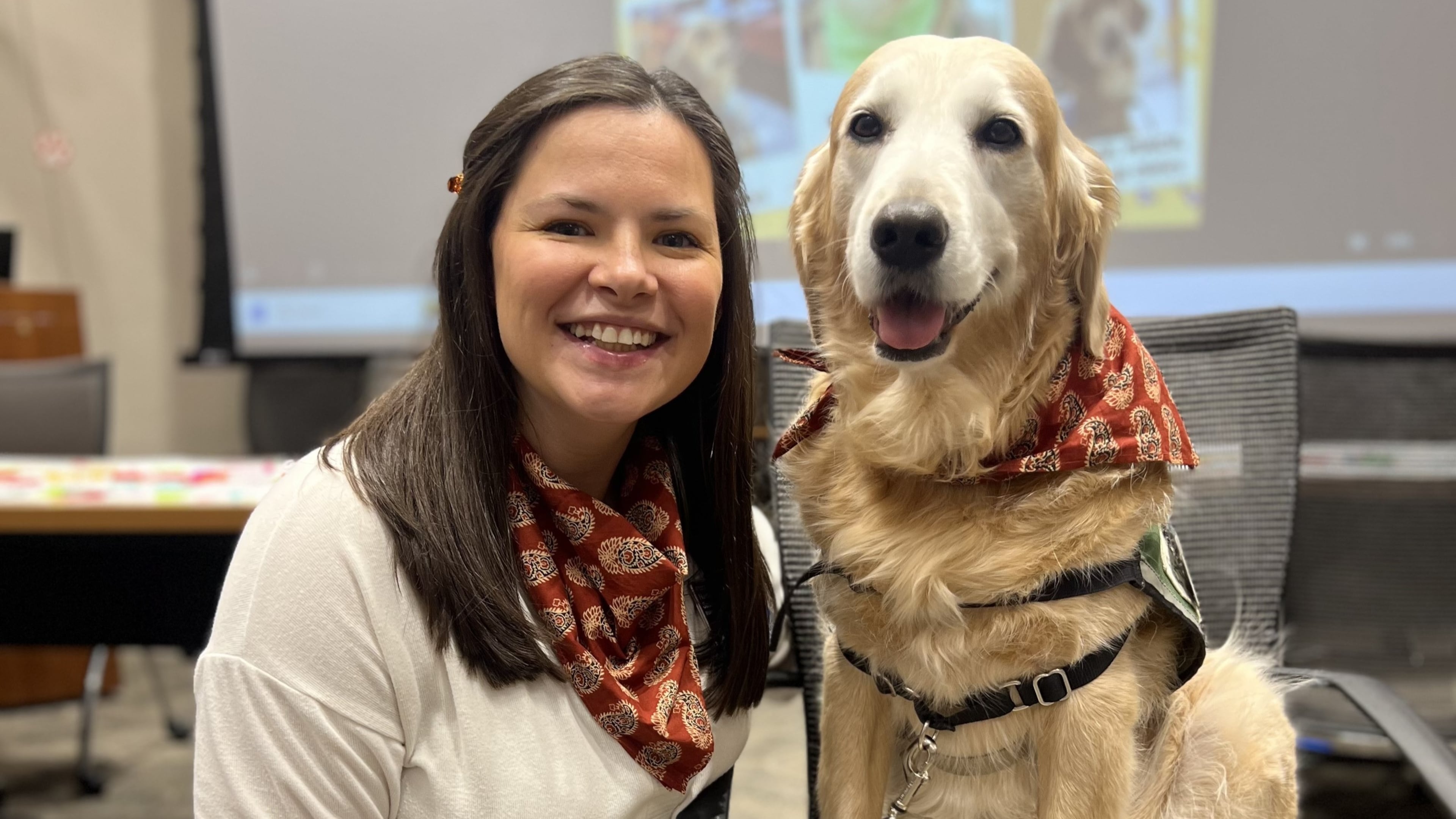 Nugget with his handler and mom, Harleigh Smith. (Courtesy of Wellstar Children's Hospital of Georgia)