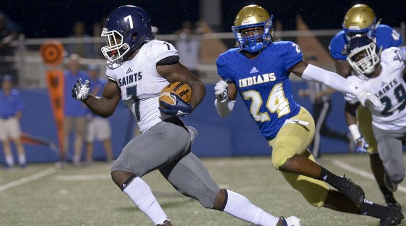 On the run: Cedar Grove running back Rashod Dubinion (7) runs for yardage in the first half of Friday's game at McEachern. (Daniel Varnado/Special)