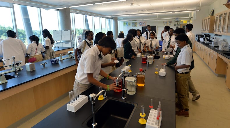Students work in a biology lab at Charles R. Drew Charter School.