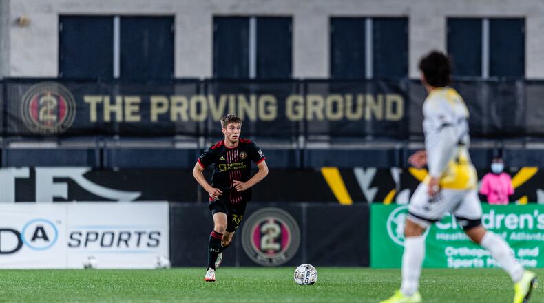 Atlanta United 2 defender Noah Cobb #39 dribbles during the USL match against the Charleston Battery at Fifth-Third Bank Stadium in Atlanta, Georgia, on Sunday March 27, 2022. (Photo by Mitch Martin/Atlanta United)