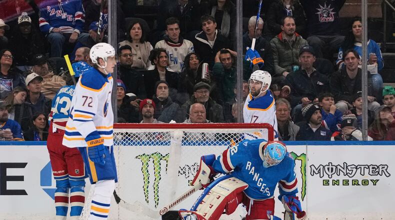 Buffalo Sabres' Jason Zucker (17) celebrates after scoring a goal as New York Rangers goaltender Jonathan Quick (32) reacts during the second period of an NHL hockey game Thursday, Jan. 8, 2026, in New York. (AP Photo/Frank Franklin II)
