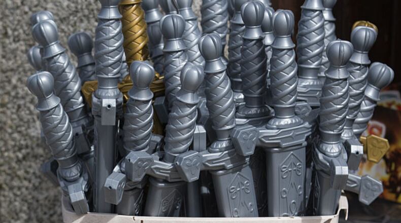 FILE PHOTO: Excalibur swords are displayed for sale outside a shop in Tintagel in Cornwall, England.