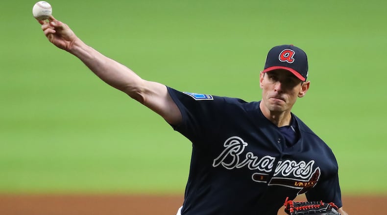 Braves pitcher Brandon McCarthy delivers a pitch against the Yankees during the first inning in a MLB baseball exhibition game on Monday, March 26, 2018, in Atlanta. Curtis Compton/ccompton@ajc.com