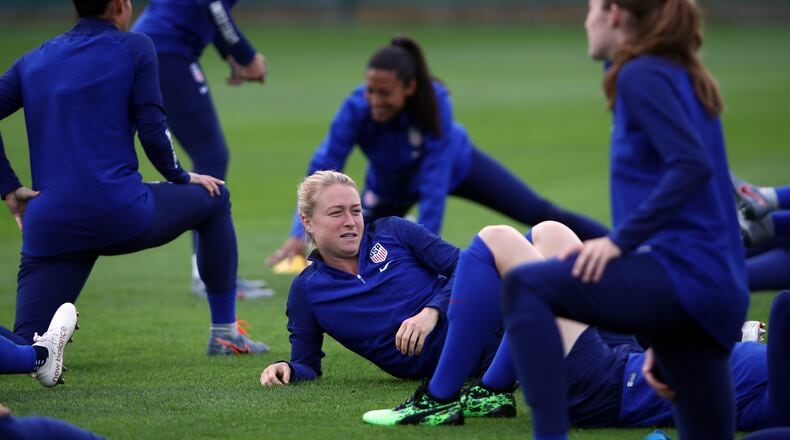 Emily Sonnett warms up during a USA training session during the 2019 FIFA Women's World Cup competition at Parc des Loisirs on June 19, 2019, in Touques, France. Sonnett, 25, a Cobb County native, is one of the defenders on the team. Two other Georgia athletes, midfielder Morgan Brian of St. Simons Island and defender Kelley O’Hara of Fayetteville, also are on the 24-member team, according to the team roster. (Photo by Alex Grimm/Getty Images)