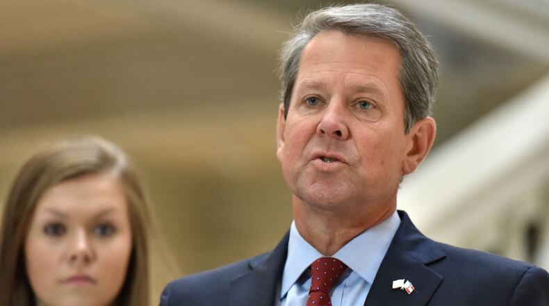 Republican Brian Kemp speaks during a press conference Saturday at the Georgia Capitol, a day after his Democratic opponent in the governor’s race, Stacey Abrams, ended her campaign. HYOSUB SHIN / HSHIN@AJC.COM