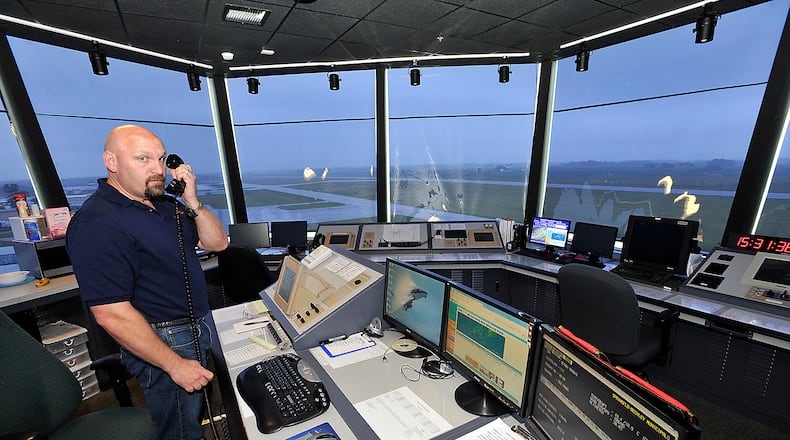 Bill Masseth, an air traffic controller at Springfield Beckley Municipal Airport, at work in the airport’s traffic control tower in 2013. Bill Lackey/Staff