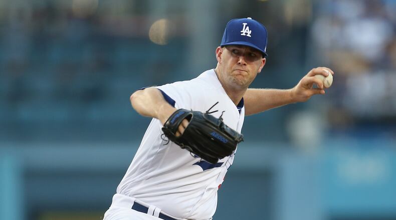 Ex-Brave Alex Wood of the Dodgers throws a pitch against the Giants at Dodger Stadium on July 28, 2017 in Los Angeles, California. (Photo by Stephen Dunn/Getty Images)