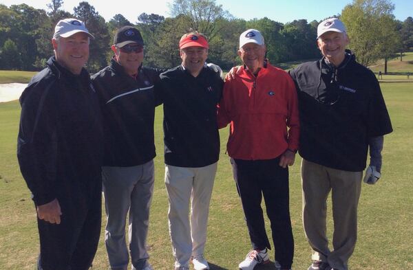 McWhorter (far left) poses for a photo with UGA coach Kirby Smart (center) at a golf event for former Bulldogs football letterwinners. Also in the photo are Tim Chapman (between McWhorter and Smart), Pete Dickens (second from the right) and Mixon Robinson (far right). (Courtesy of Mac McWhorter)