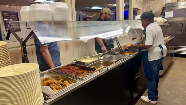 Lunch-hour diners order meals at Macon's Cox Cafe. (Joe Kovac Jr./AJC)