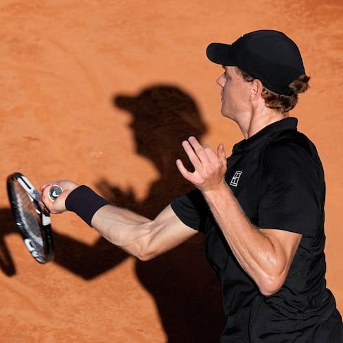Jannik Sinner, of Italy, returns the ball to Casper Ruud, of Norway, during the final match at the Italian Open tennis tournament, in Rome, Sunday, May 17, 2026. (AP Photo/Alessandra Tarantino)