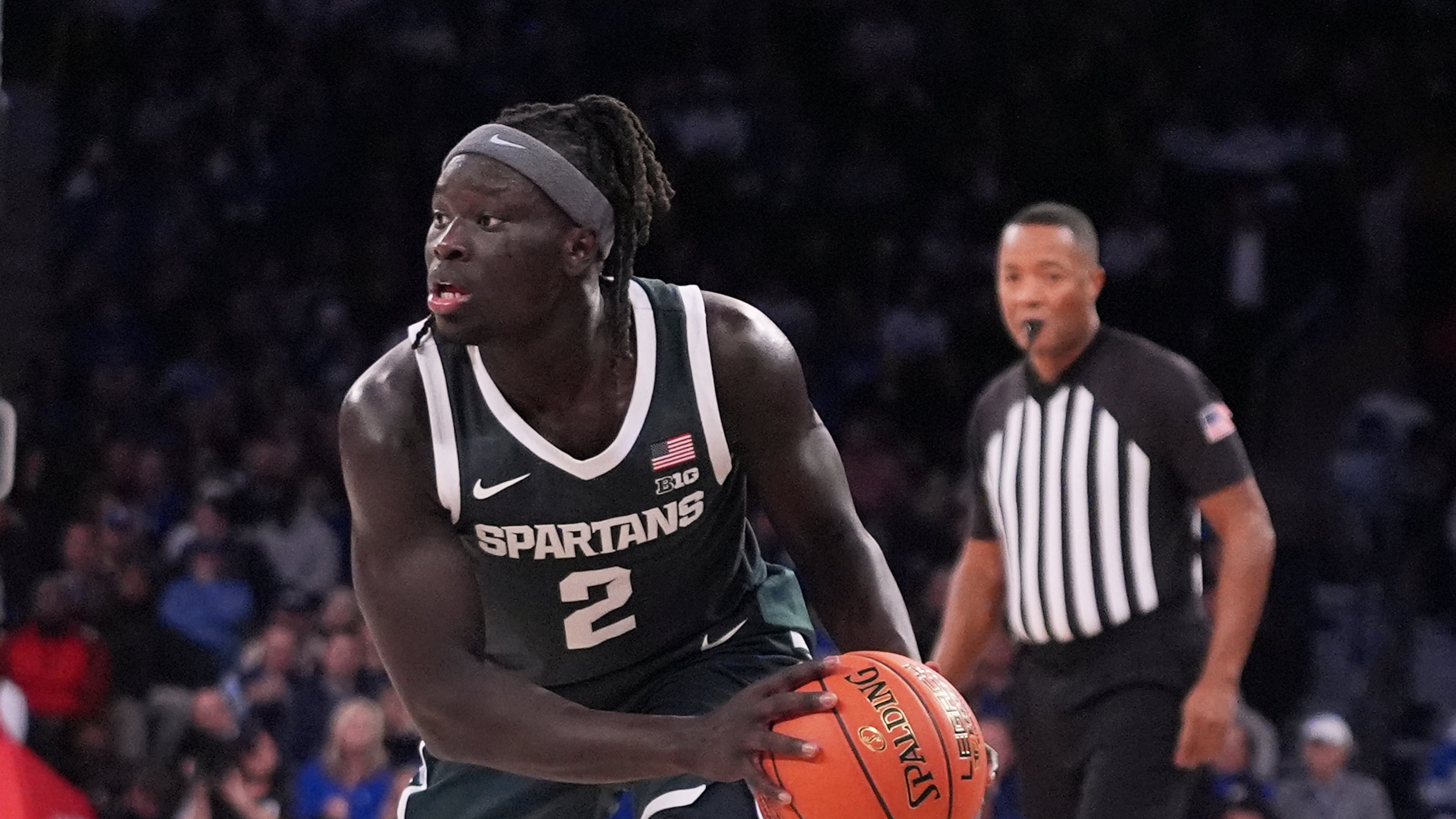 Michigan State's Kur Teng (2) looks to pass during the second half of an NCAA college basketball game against Kentucky Tuesday, Nov. 18, 2025, in New York. (AP Photo/Frank Franklin II)