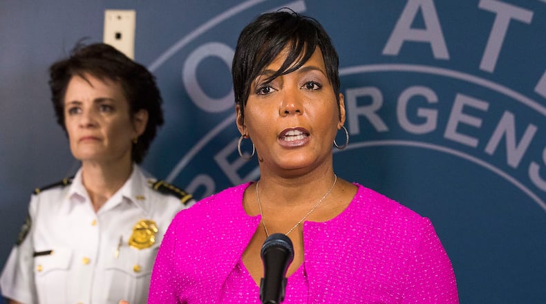 10/07/2019 — Atlanta, Georgia — Atlanta Police Chief Erika Shields (left) listens as Atlanta Mayor Keisha Lance Bottoms speaks during a presser at the Atlanta Public Safety Headquarters, Monday, October 7, 2019. (Alyssa Pointer/Atlanta Journal Constitution)