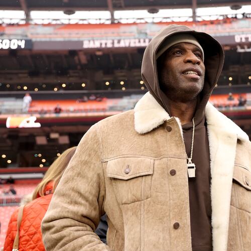 FILE - University of Colorado head coach Deion Sanders stands on the sidelines prior to the start of an NFL football game between the Cleveland Browns and the Tennessee Titans, Sunday, Dec. 7 2025, in Cleveland. (AP Photo/Kirk Irwin, File)